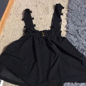 black skirt with overalls